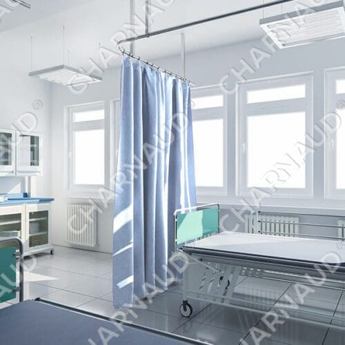 a room with a hospital bed and a curtain