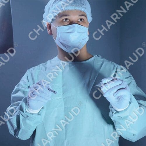 a person wearing surgical gown and mask