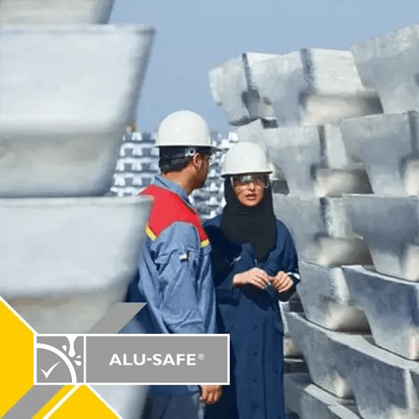 a man and woman wearing hard hats and helmets